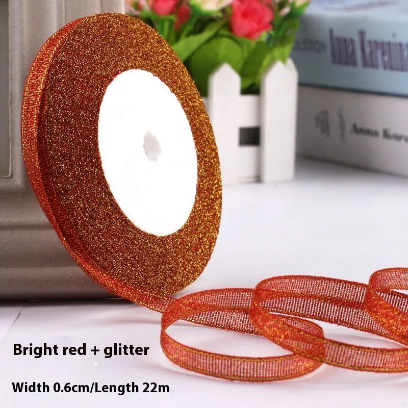 Roll of polyester gift packaging ribbon with 0.6cm width and 22 metre length in various colour options