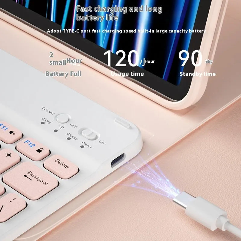 Compact white Bluetooth keyboard for tablet and PC use on a wooden desk