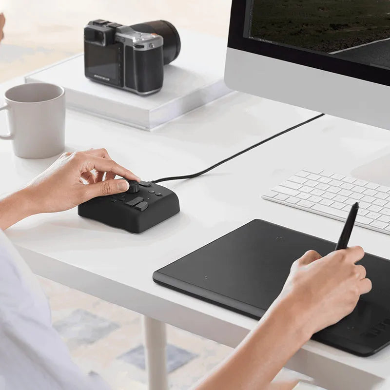TourBox NEO editing controller auxiliary keyboard for digital creators on desk