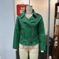 Black punk locomotive style jacket with a Peter Pan collar and an adjustable belt.