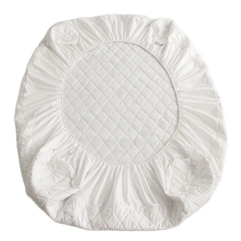 Diamond lattice quilted waterproof mattress protector set with fitted sheet and pillowcases in solid colour.