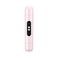 White and pink portable electric body hair trimmer with USB cable on a plain background.