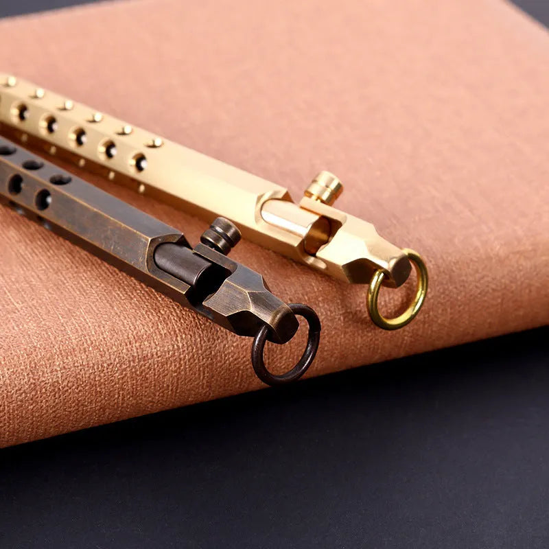 Brass hexagonal bolt roller pen showing six-angle construction with 0.5mm tip