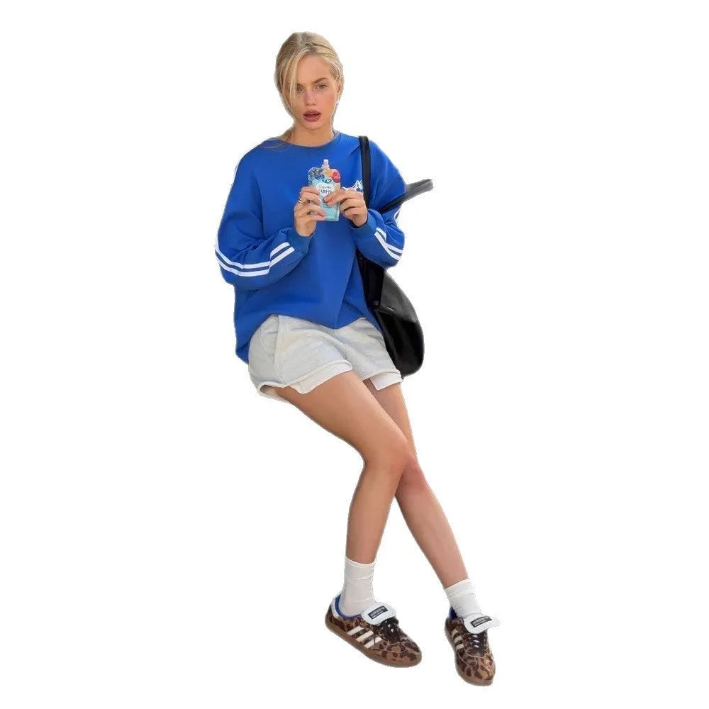 Blue vintage stripe cotton sweater with loose fit round neck and long sleeves for street fashion