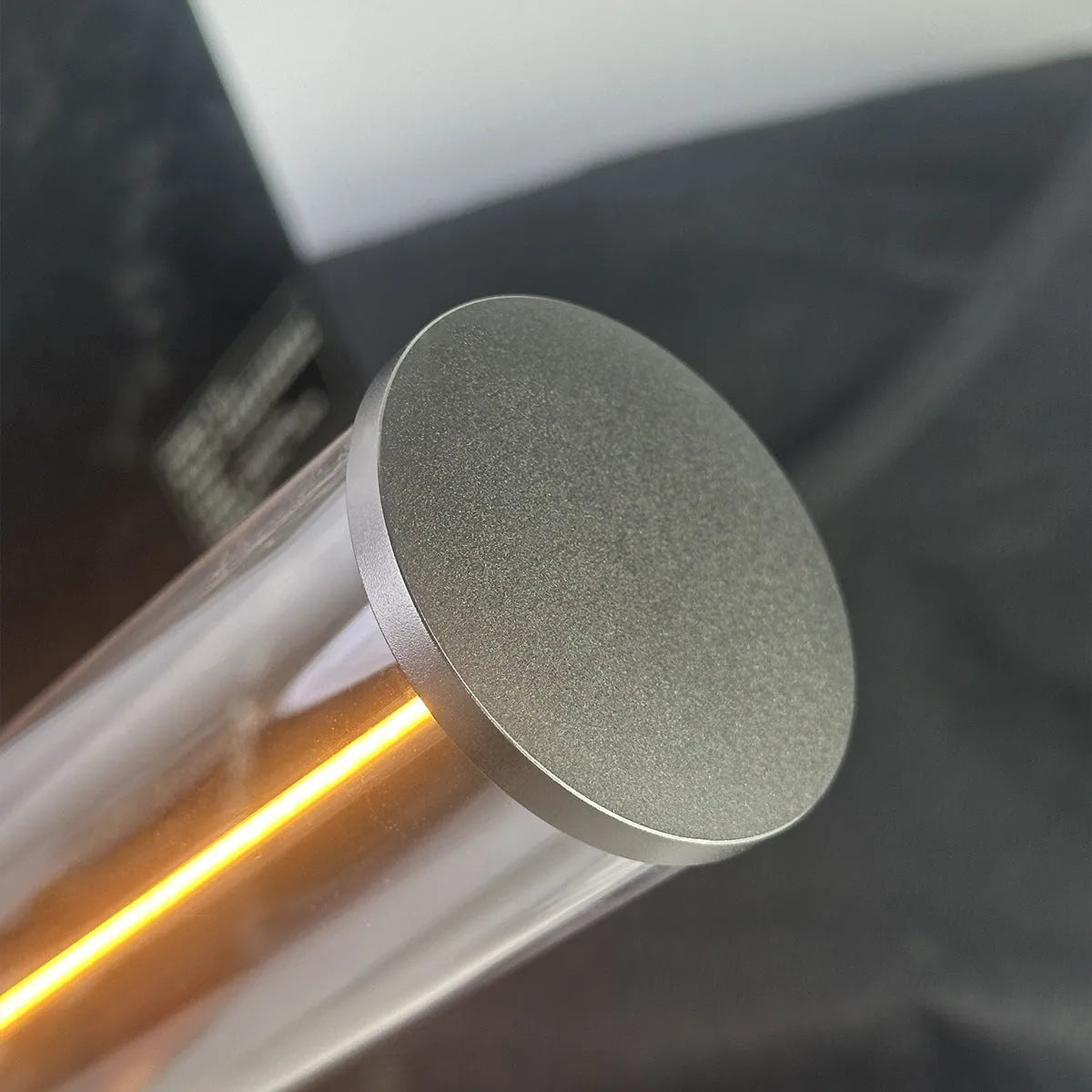 Modern circular glass LED night light with USB charging port and magnetic base