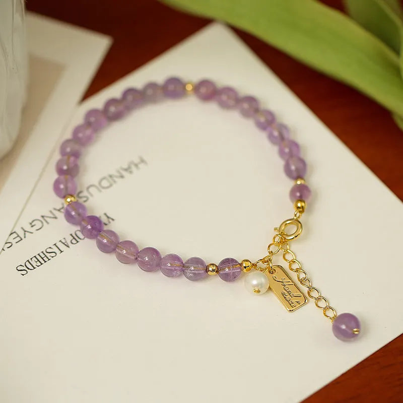 Natural lavender amethyst crystal bracelet with animal or zodiac motif for women.