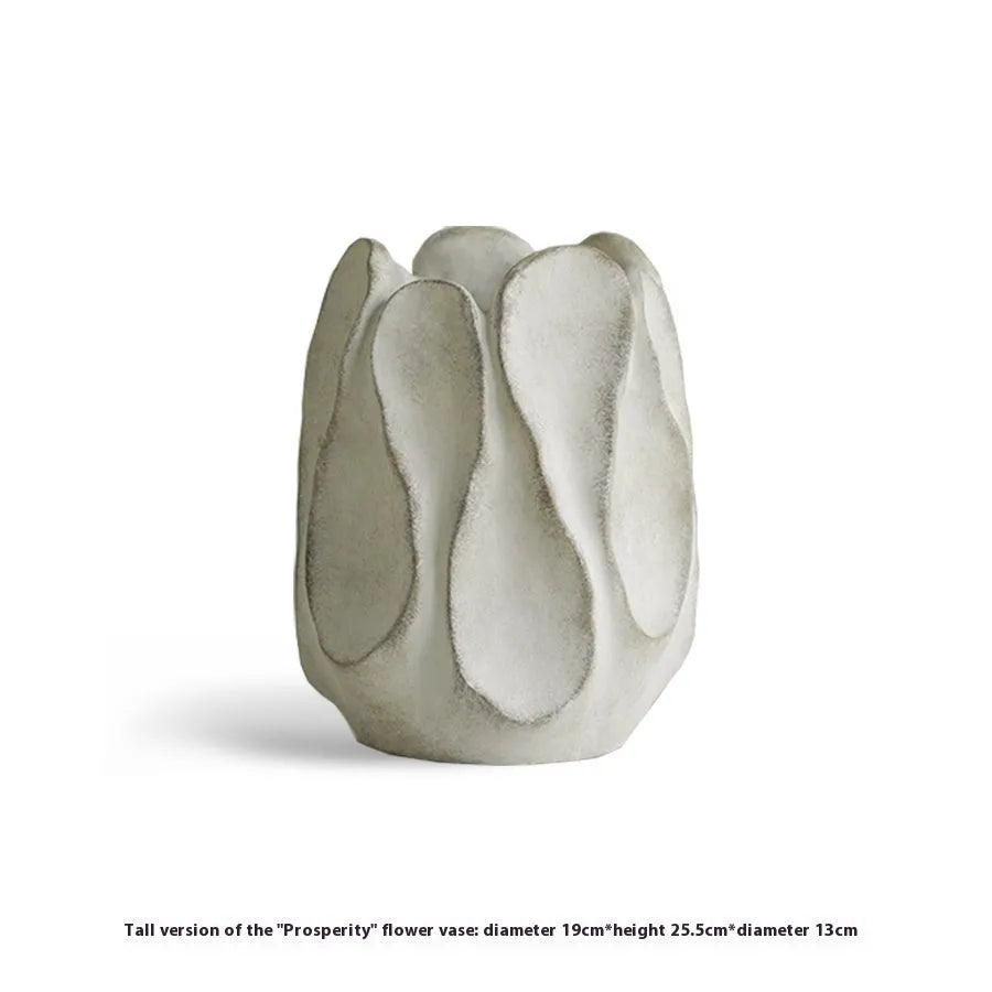 Irregular ceramic vase for flower arrangements in magnesium clay with natural textured finish