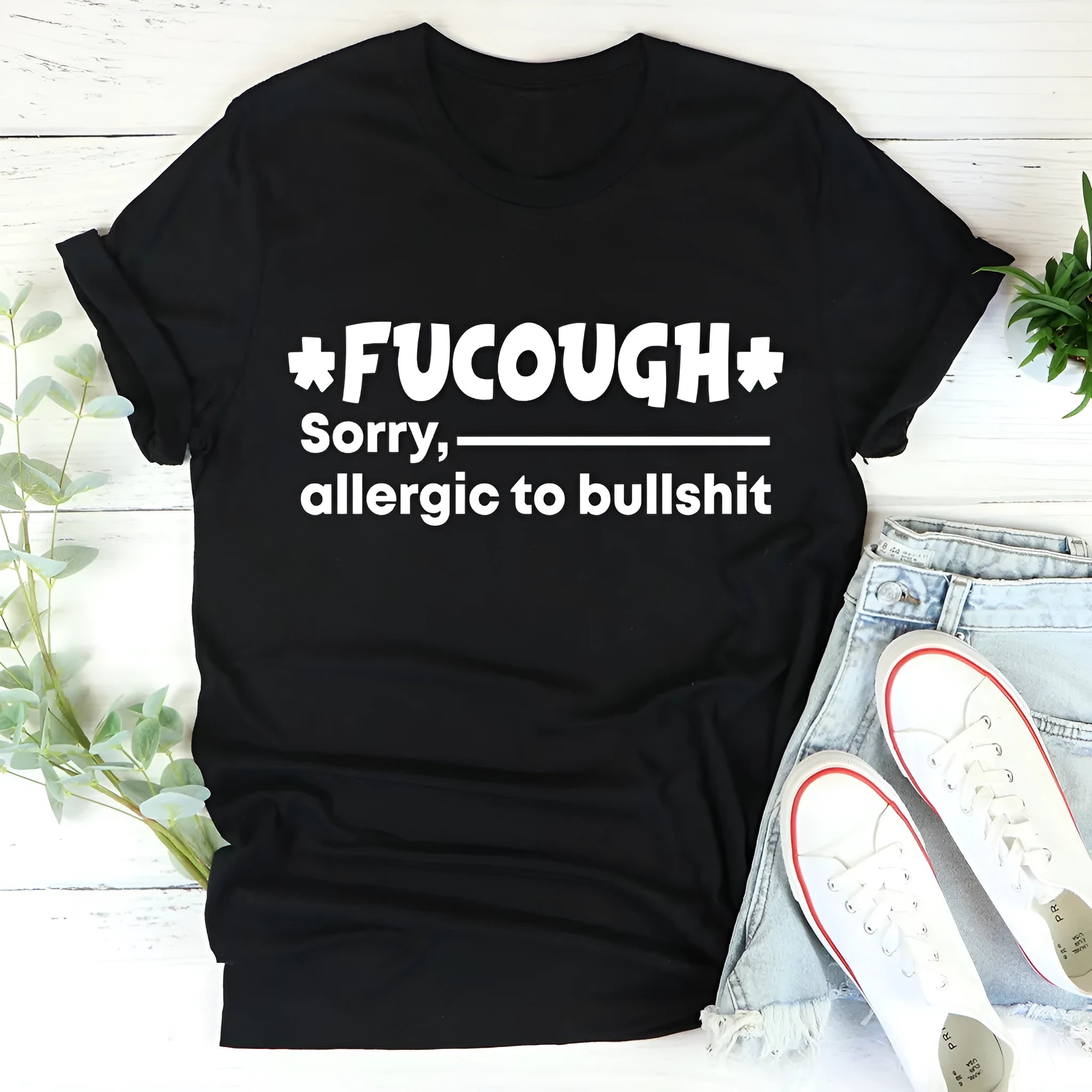 Black cotton round neck t-shirt with loose short sleeves and straight cut design