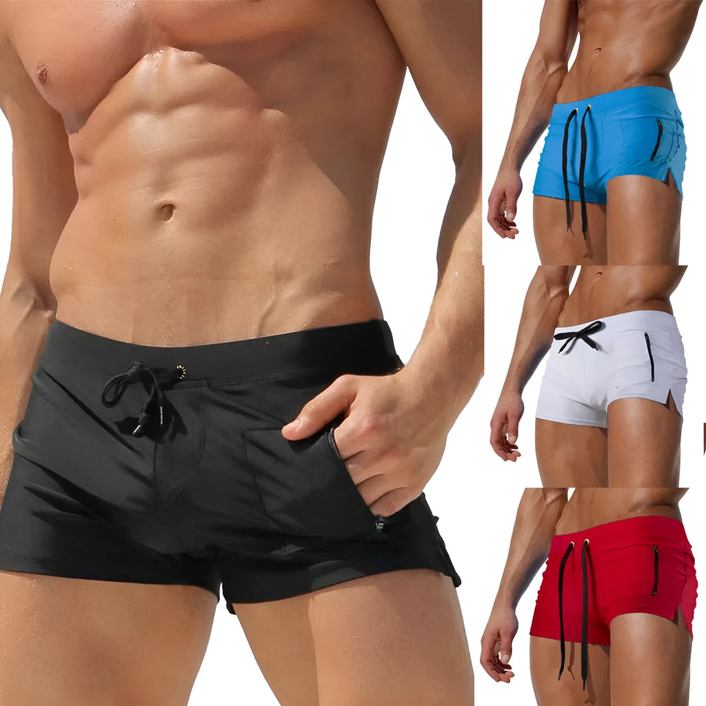 Men's black high waist swimming trunks with a front lace-up closure on a plain background.