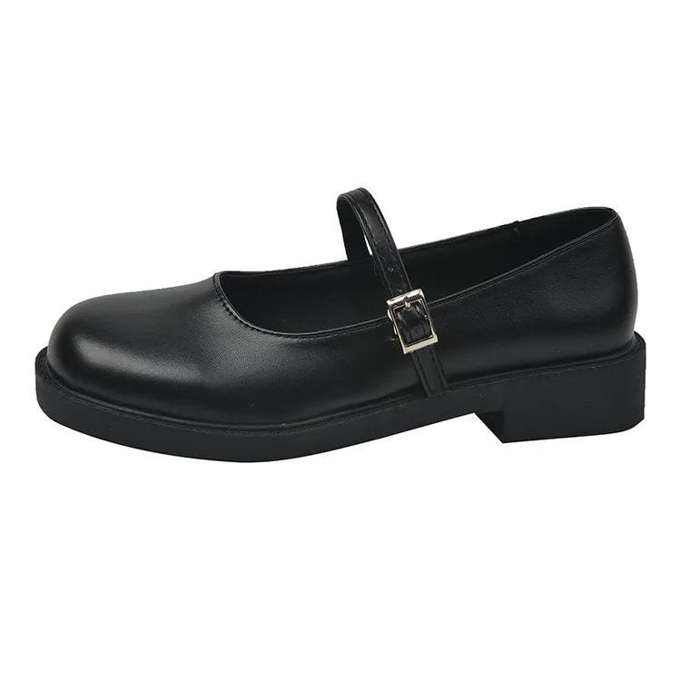 Women's solid colour French vintage style leather flats with a flat heel and round toe.