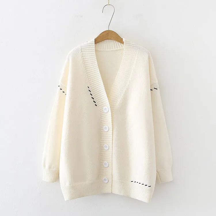 Women's loose fit long sleeve knitted cardigan coat in black and white solid colours