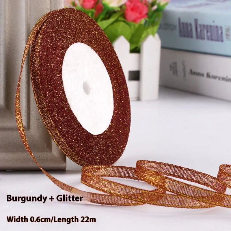 Roll of polyester gift packaging ribbon with 0.6cm width and 22 metre length in various colour options