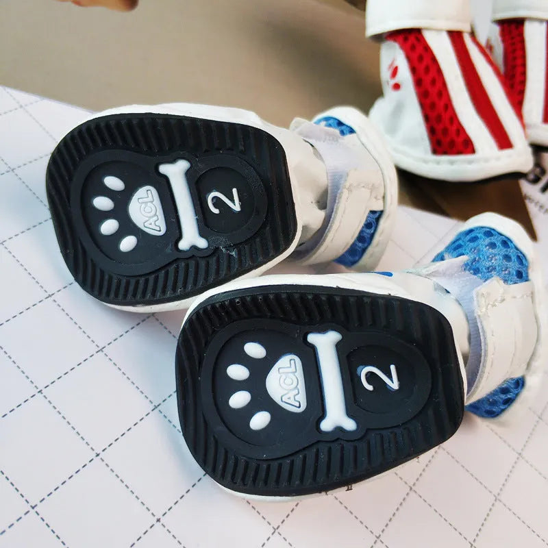 Blue zipper dog shoes with non-slip soles for small dogs, shown alongside pink and red colour options.