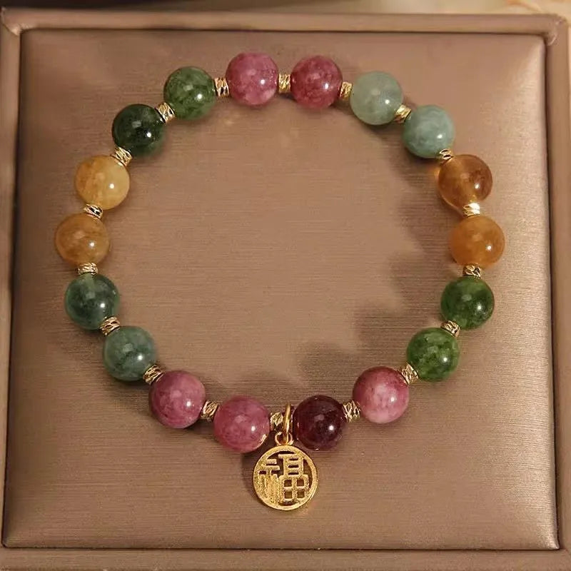 Tourmaline bracelet with natural stones in floral design and electroplated geometric setting