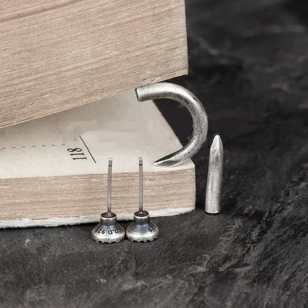 S925 sterling silver nail stud earring available in straight and curved retro punk styles for unisex wear