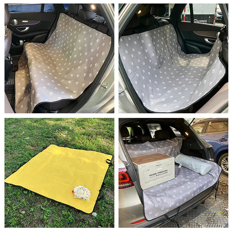 Grey cloth car pet mat with dog footprint print covering a car rear seat.
