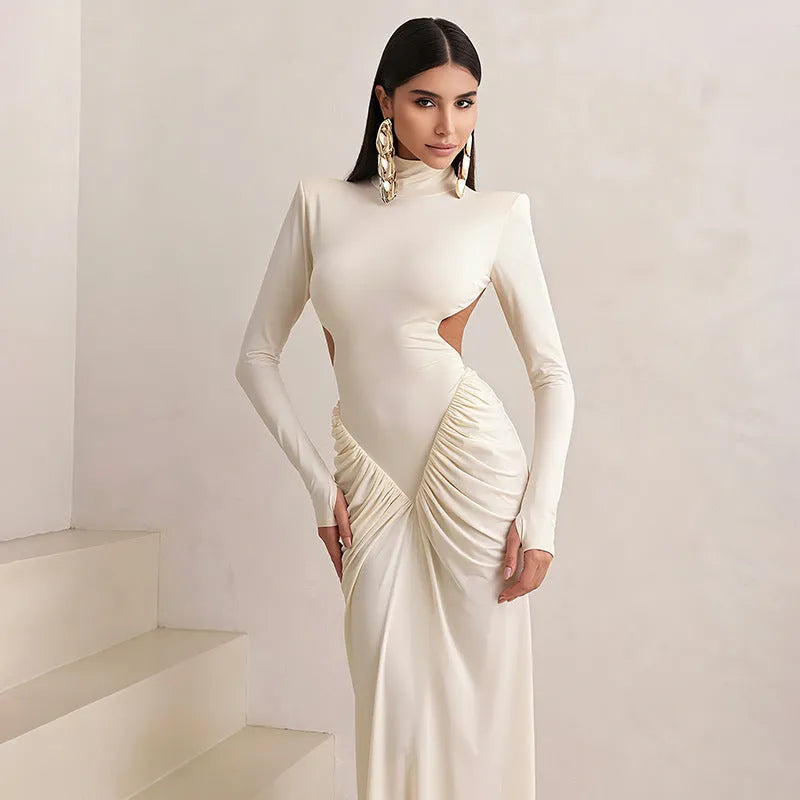 Women's slim fit backless dress with high collar, long sleeves and pleated detail in polyester fabric