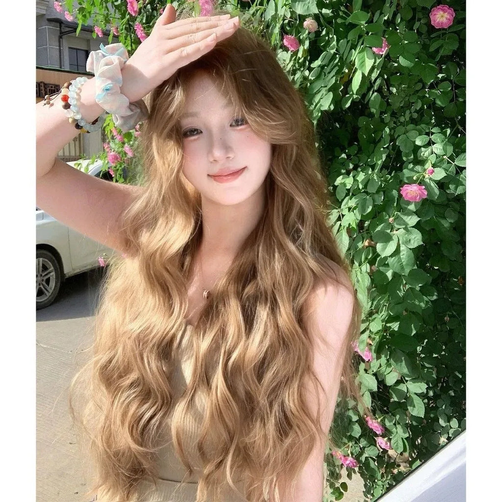 Linen brown medium-length curly synthetic wig on a display stand.