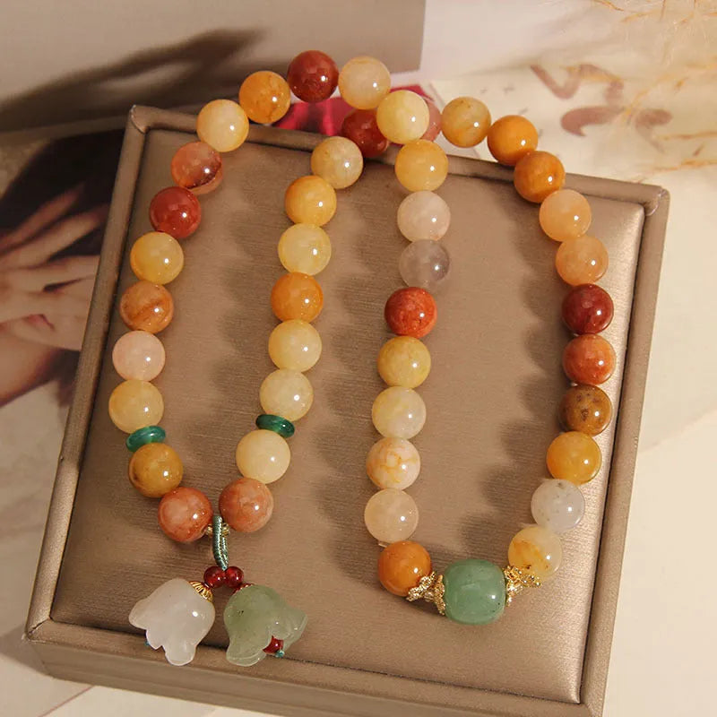 Natural jinsi jade multi-layer bracelet for women with an orchid pendant on wrist