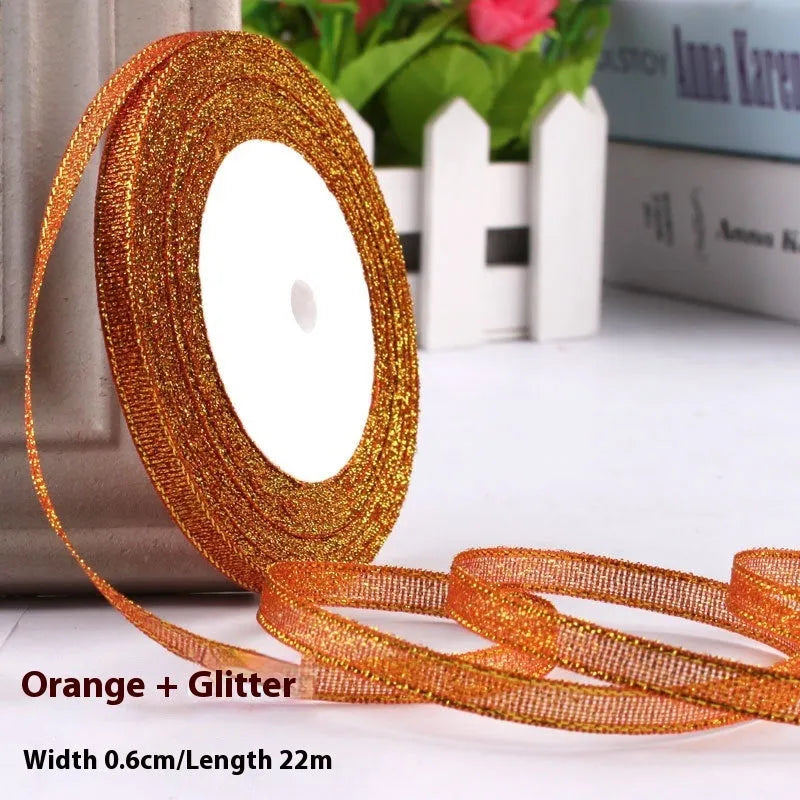 Roll of polyester gift packaging ribbon with 0.6cm width and 22 metre length in various colour options