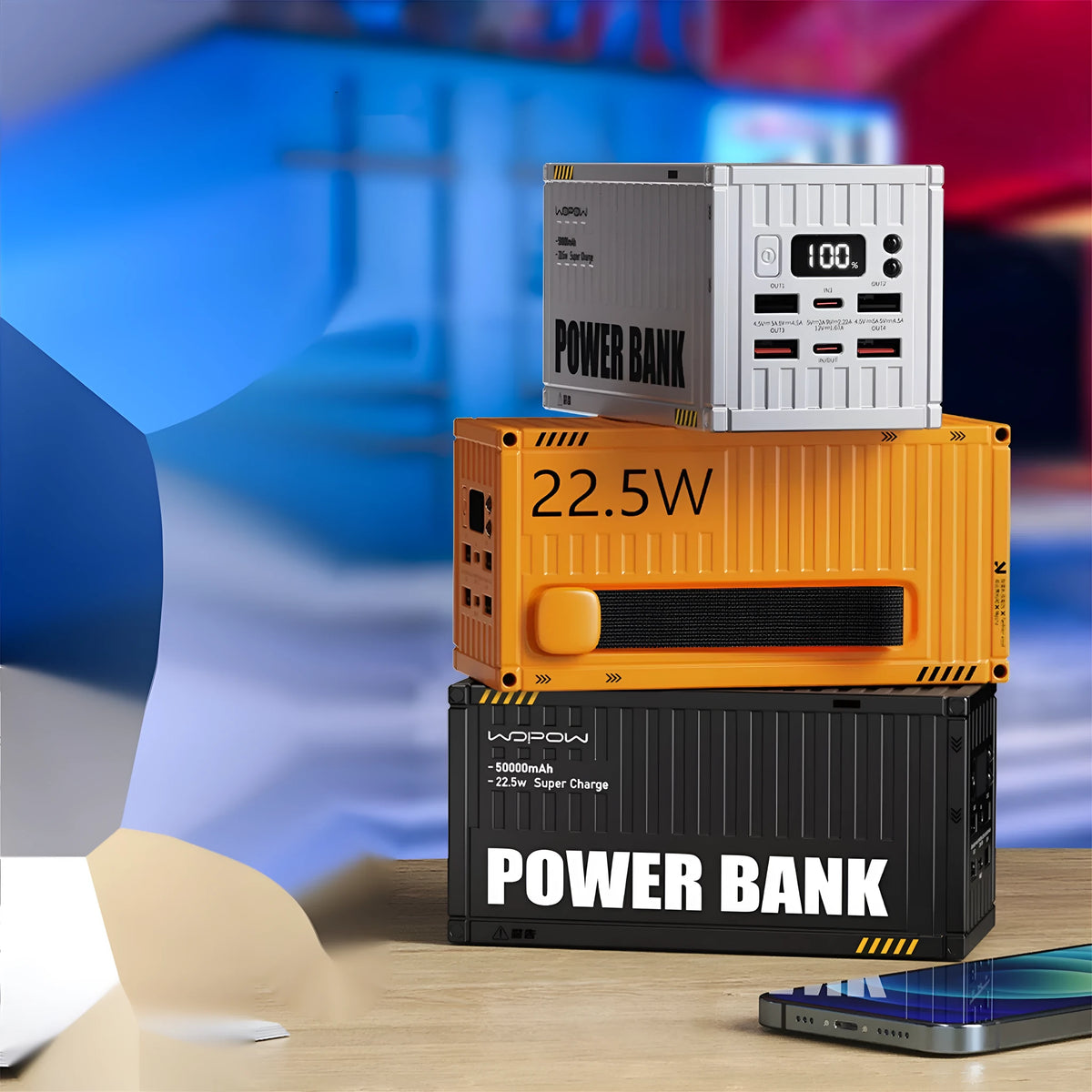 Yellow 50,000mAh power bank with digital display showing battery percentage and five output ports
