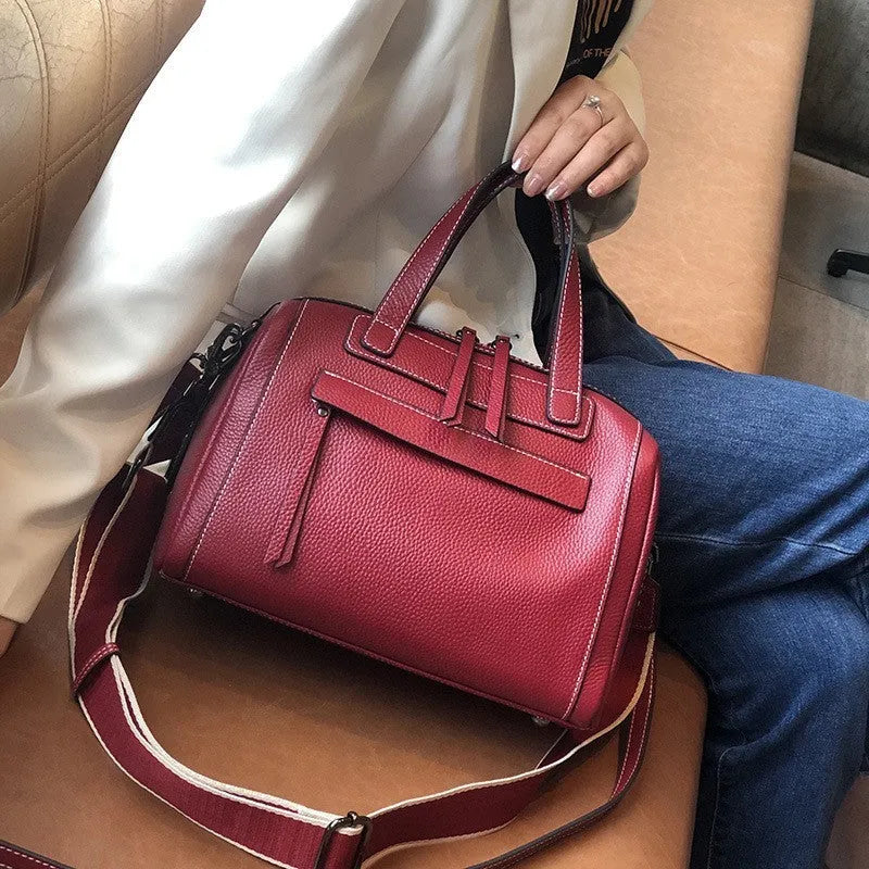 Genuine leather Boston Lychee pattern messenger bag with shoulder strap and multiple compartments