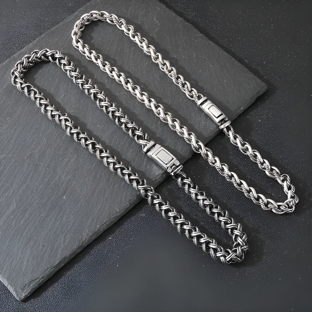 Men's titanium steel hemp flower chain necklace in antique silver finish with geometric twist design