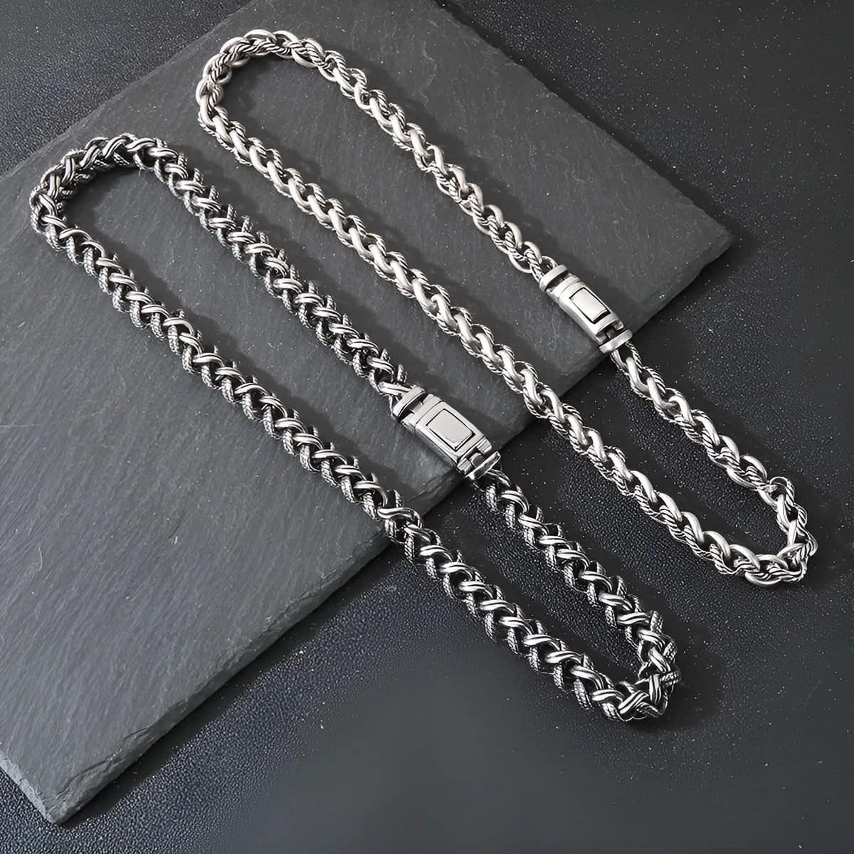 Men's titanium steel hemp flower chain necklace in antique silver finish with geometric twist design