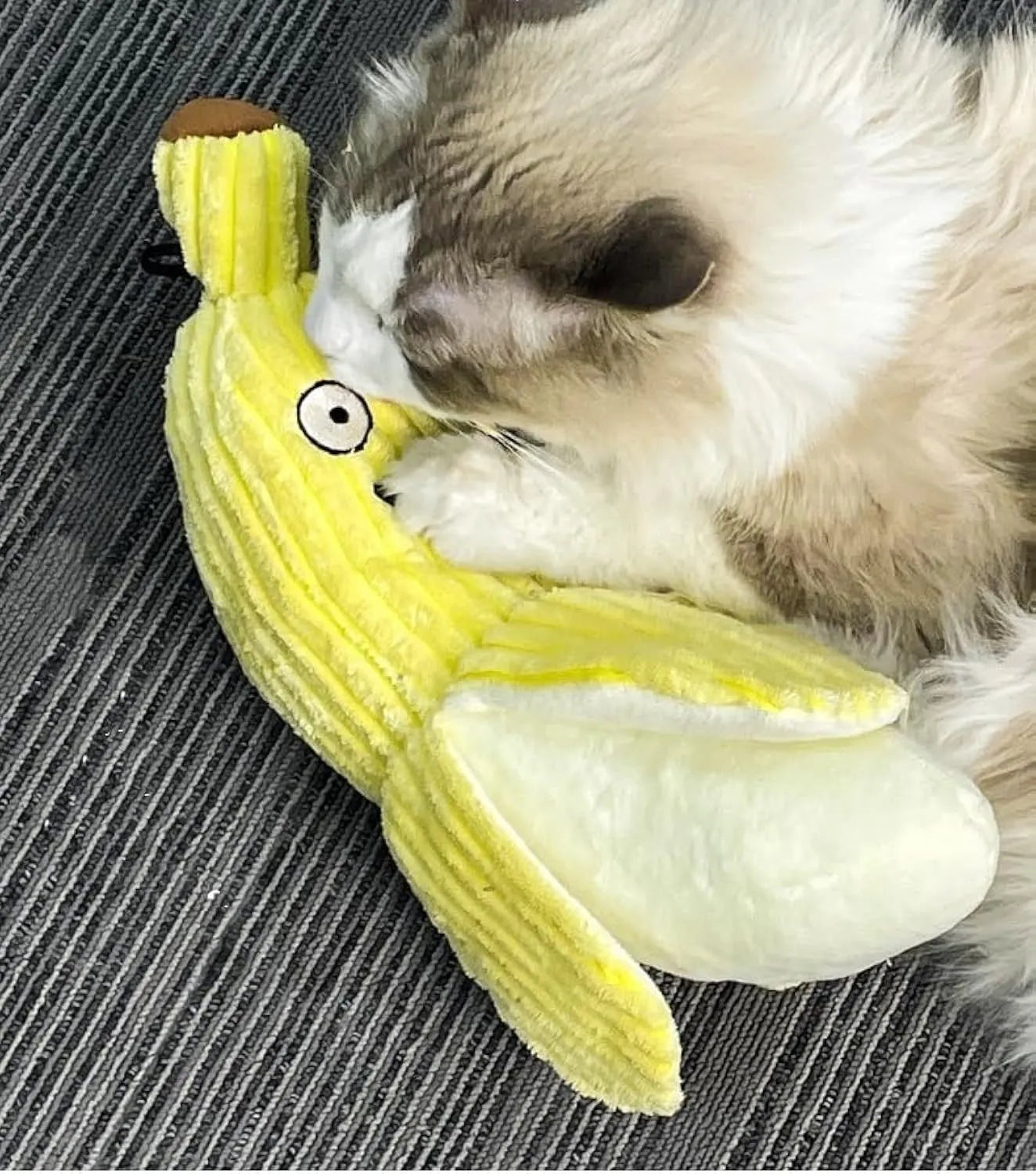 Yellow banana-shaped plush cat toy with crinkle paper and catnip filling.