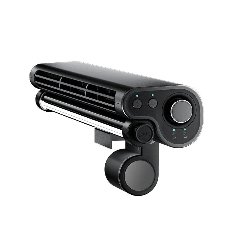 Black USB-powered bladeless clip-on fan with integrated lamp attached to a laptop screen.