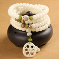 White jade Bodhi bead bracelet with 6x8mm beads in various decorative styles