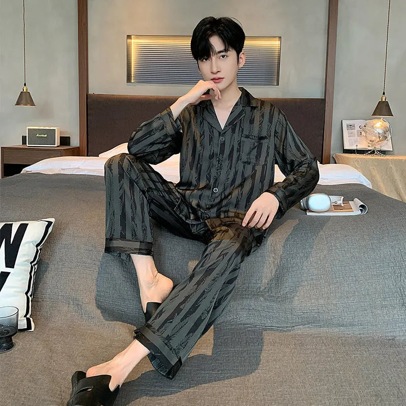 Men's black stripes ice silk pajama set showing V-neck long sleeve top and thin trousers for summer wear