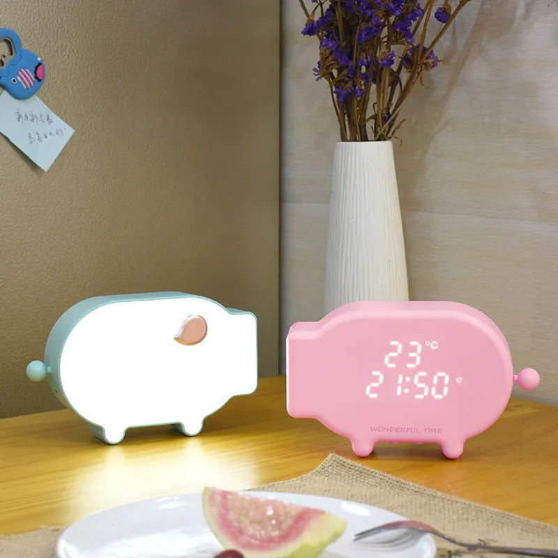 Blue LED alarm clock with temperature display and USB charging port on bedside table