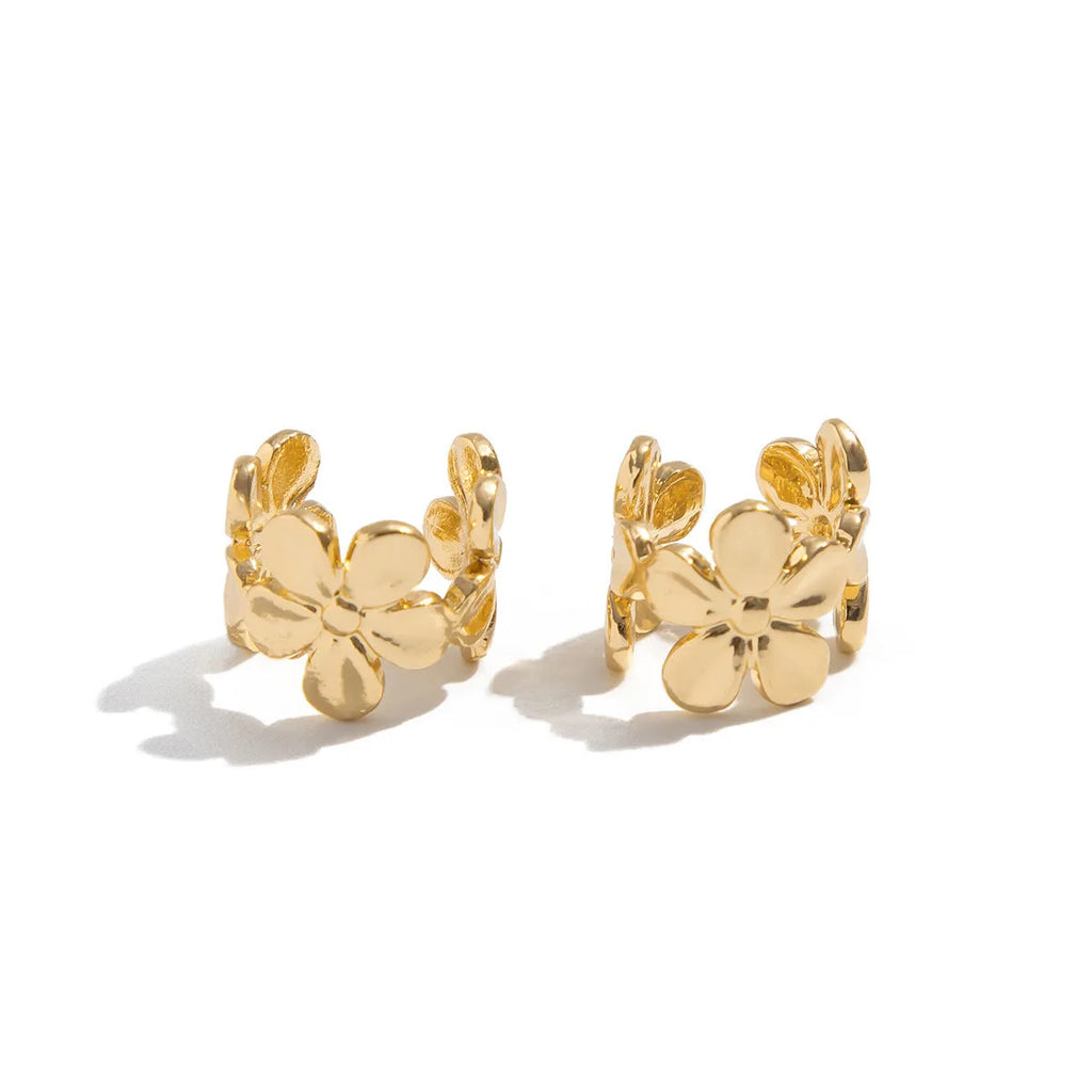 Gold women's earrings with starfish and scallop beach designs on alloy construction