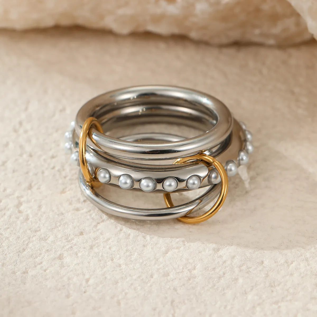 Stacked colour matching stainless steel ring set with 18K gold plating