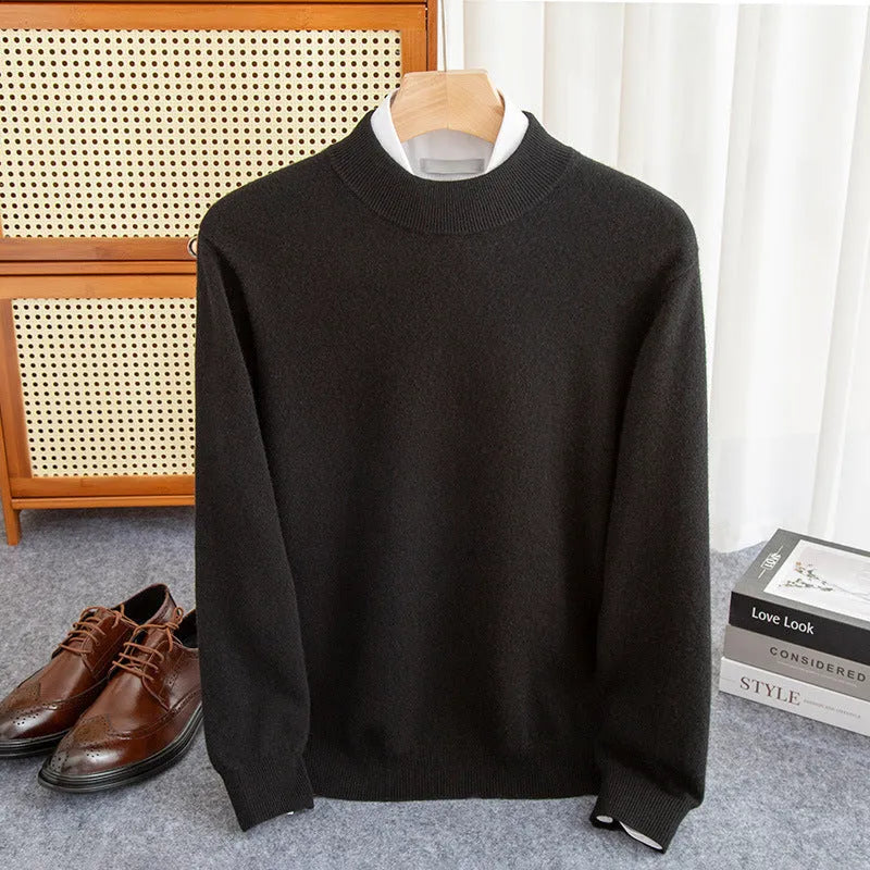 Man wearing a loose-fit half-collar wool sweater in a neutral colour for winter.