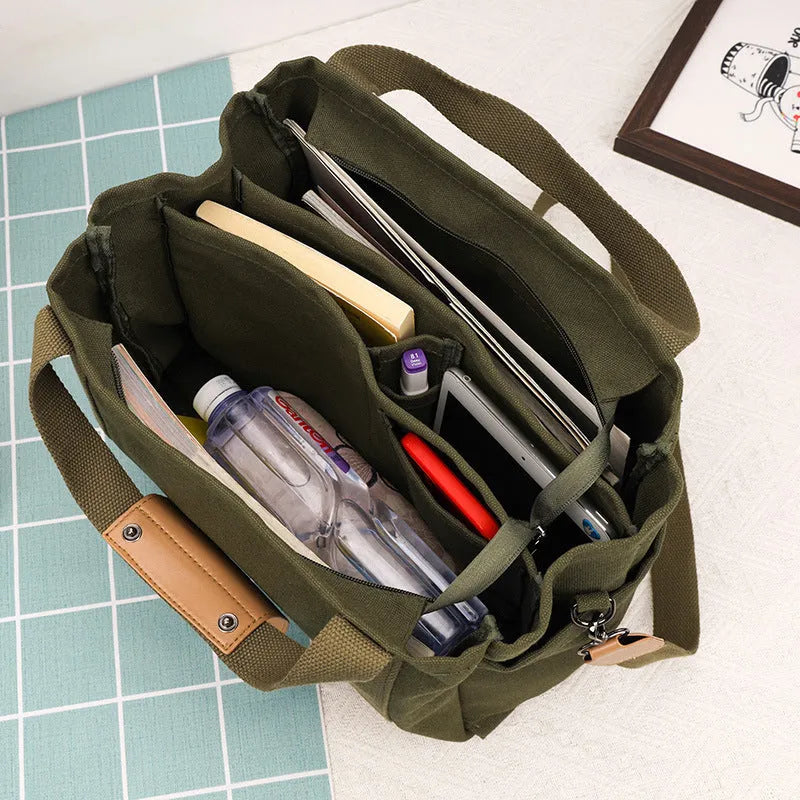 Large capacity canvas tote bag with internal organisation pockets and open on both sides zipper closure