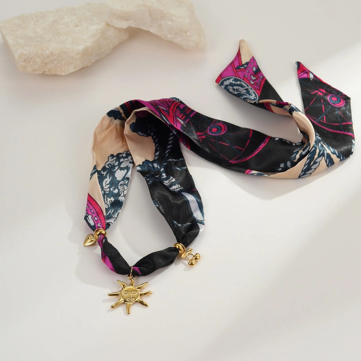 Women's geometric pendant necklace with adjustable chain on black background