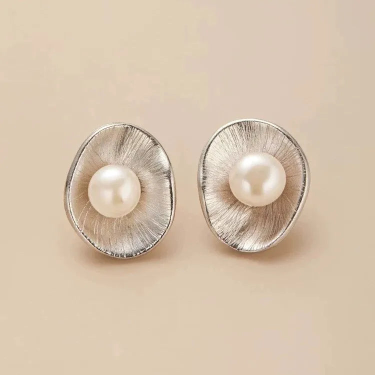 Geometric sterling silver ear studs with pearl elements and electroplated gold finish