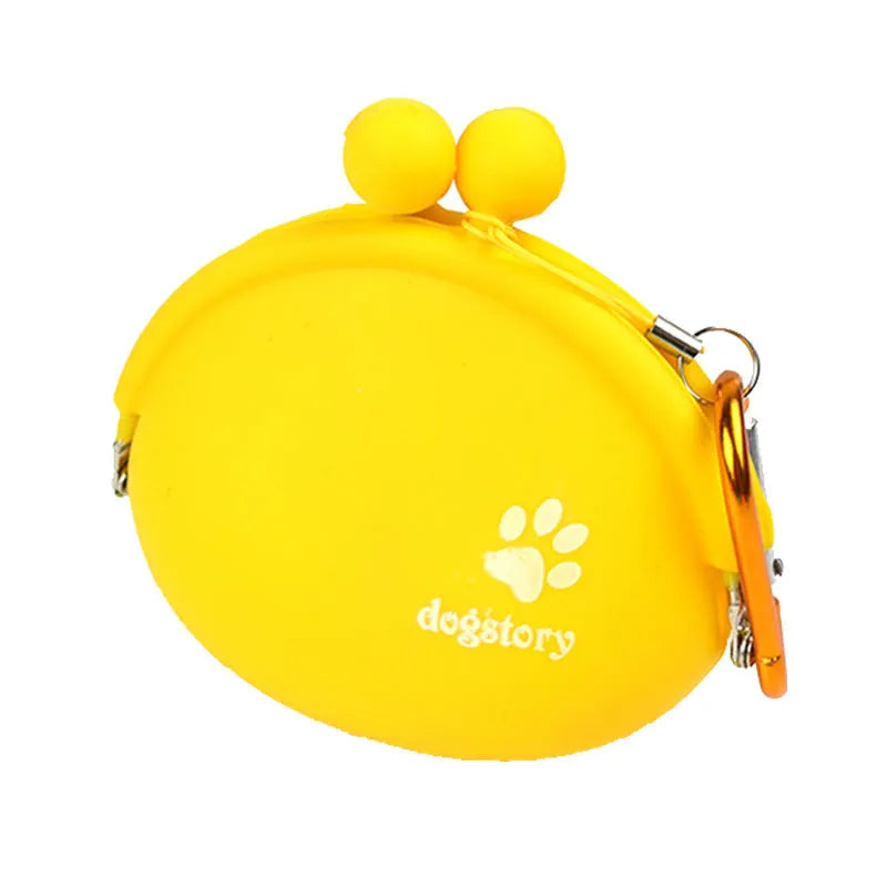 Yellow silicone dog training treat waist bag with hook-and-loop closure, shown with treats.