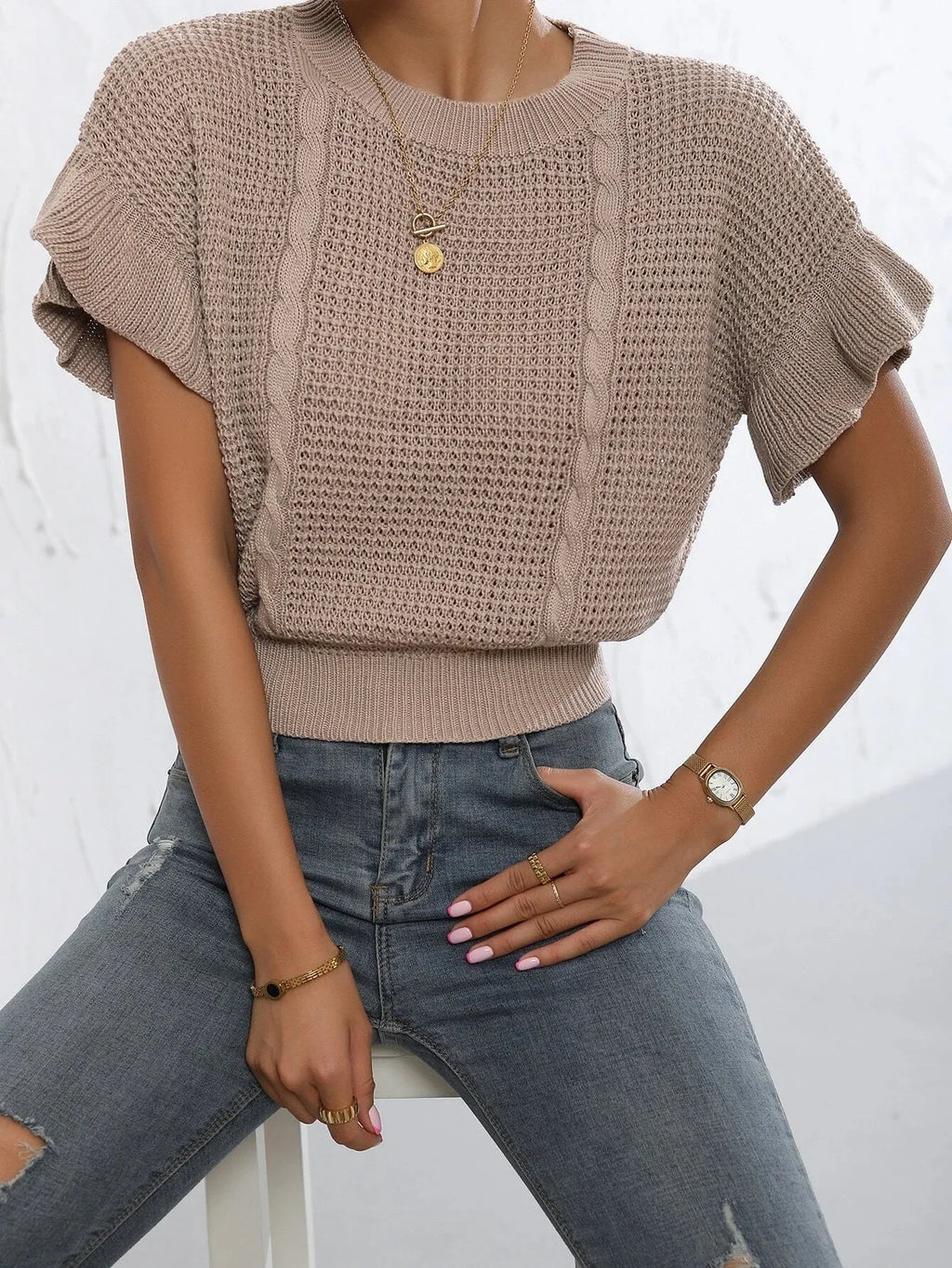 Knitted pullover sweater with twisted string ruffled short sleeves in round neck design