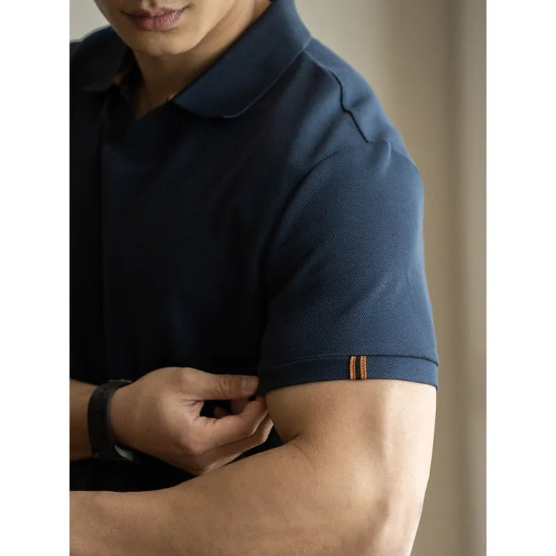 Blue short-sleeved casual polo shirt on a hanger showing the collar and button placket.