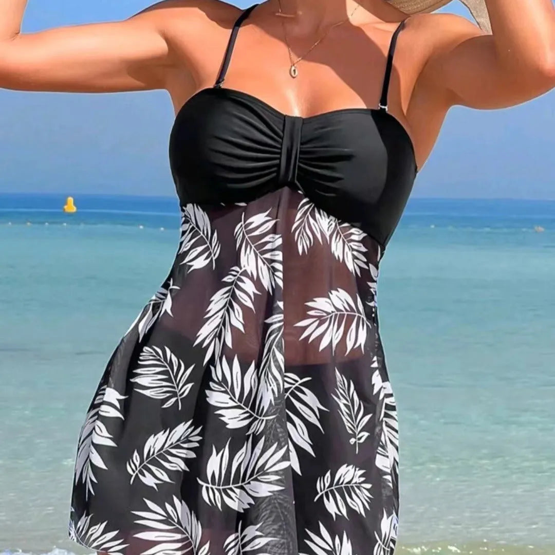 Women's high waist mesh swim briefs in black, blue, and peacock green on a mannequin.