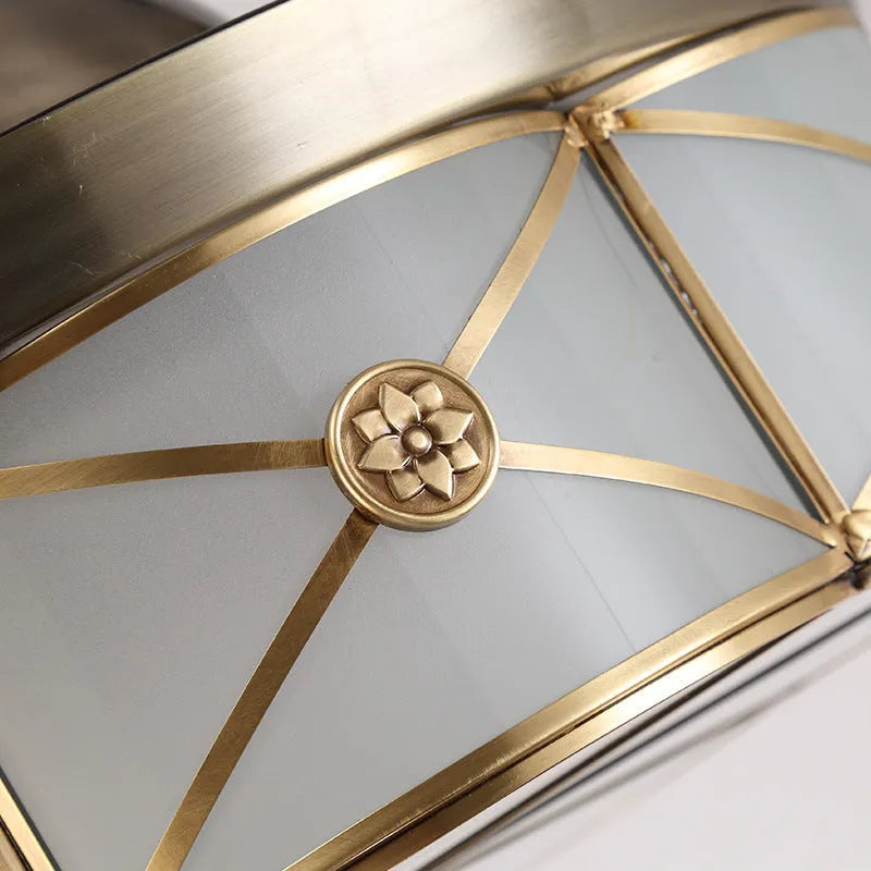 Gold 42-inch ceiling fan light with invisible blades and remote control on a white ceiling