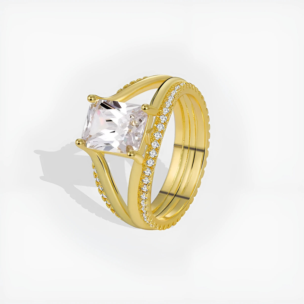 Gold square zircon geometric ring on finger showing electroplated copper construction