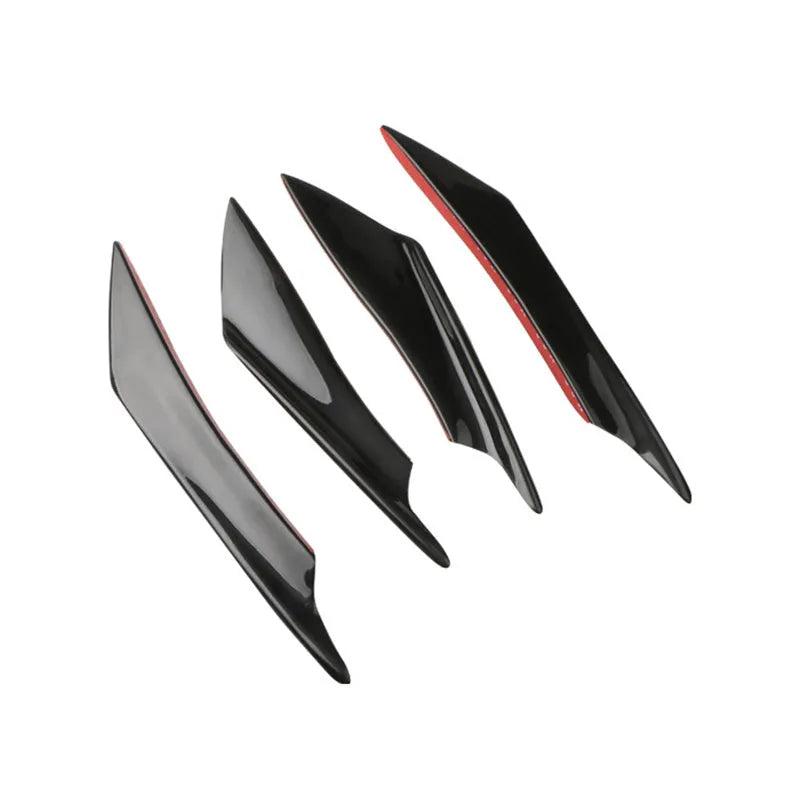 Set of four carbon fibre pattern ABS plastic bumper blades for car modification.
