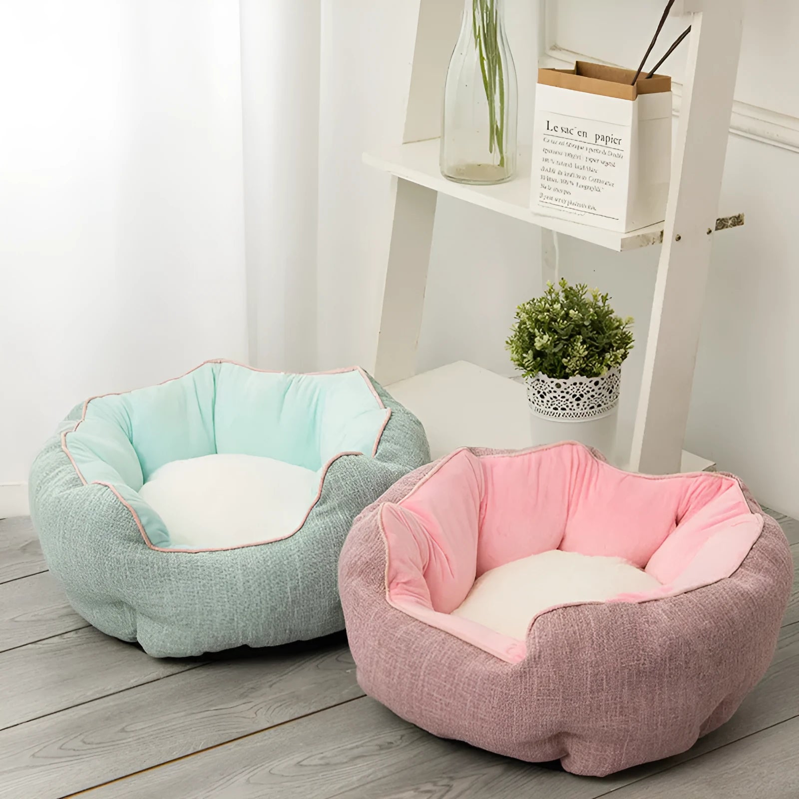 Octagonal grey pet bed with soft padded rim and removable inner mat for a small dog