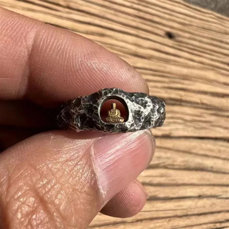 Hand-forged copper Grotto Buddha ring with rock texture finish showing size 8
