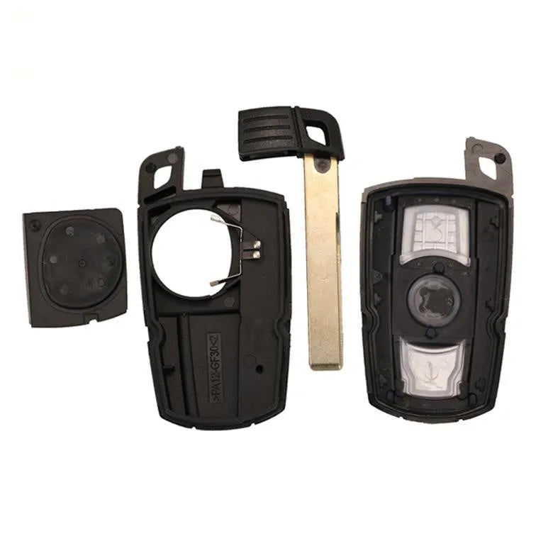 BMW semi-intelligent remote car key with three keys showing metal-plastic construction