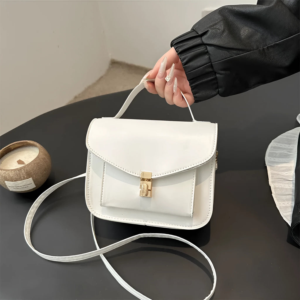 Retro style horizontal square messenger bag in PU material with sandwich pocket exterior